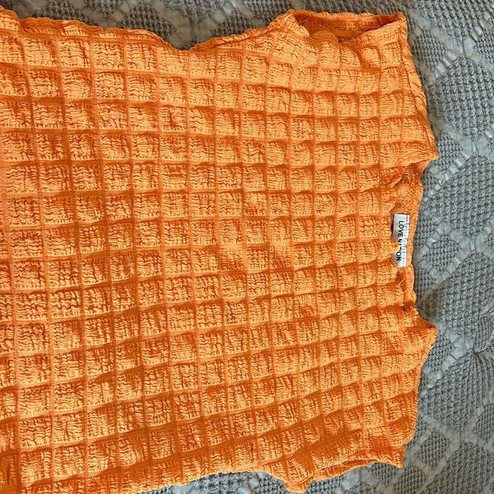 Orange top! Worn one time.